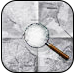 image of a map with a magnifiying glass